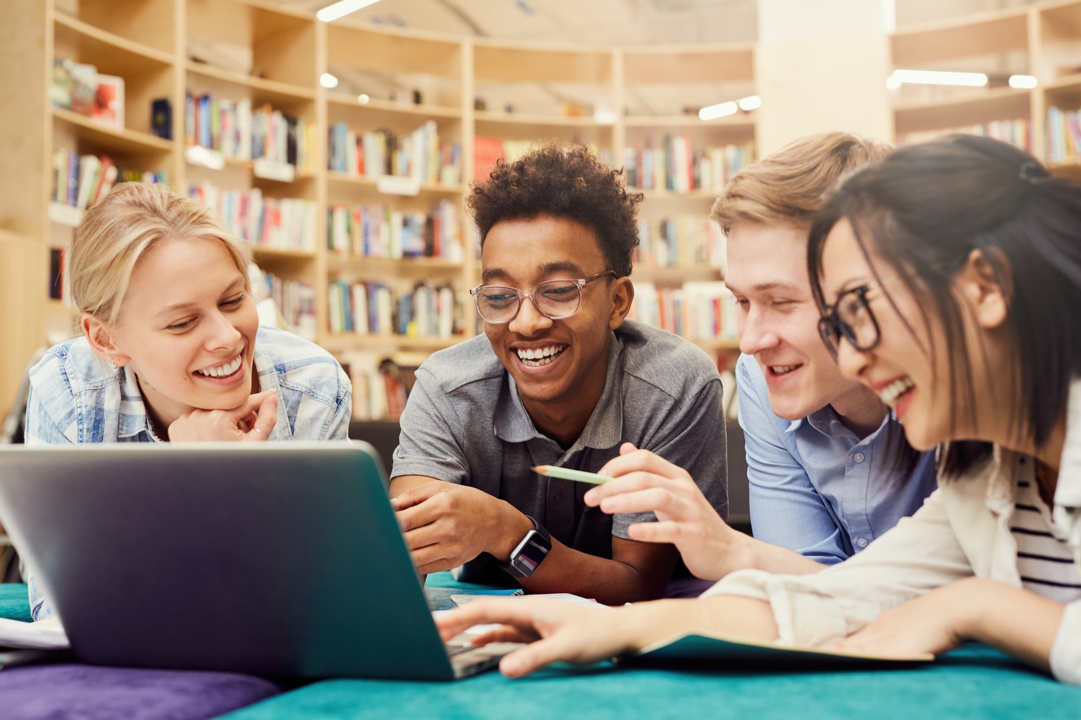 Students working in library. 