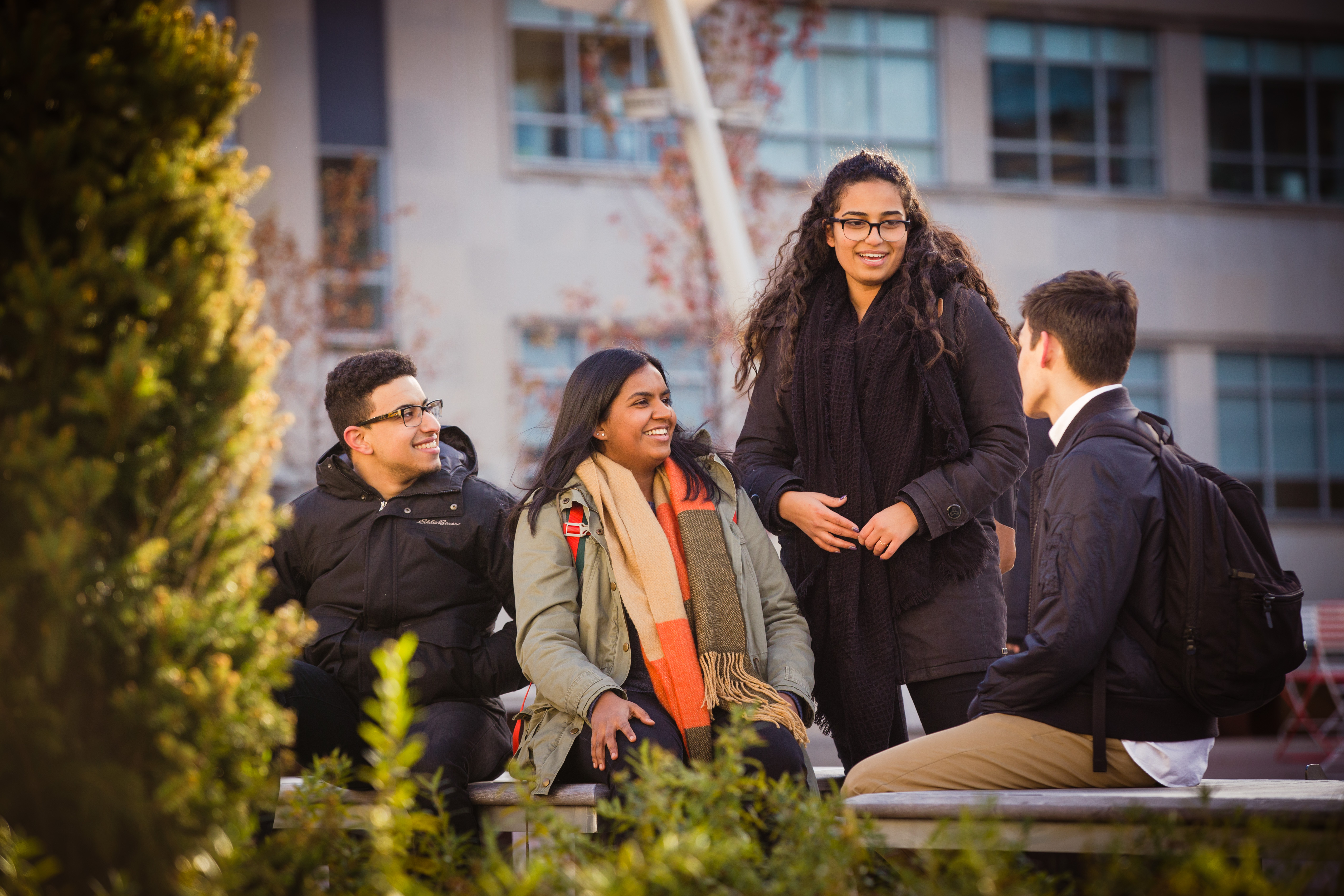 happy students talking on campus