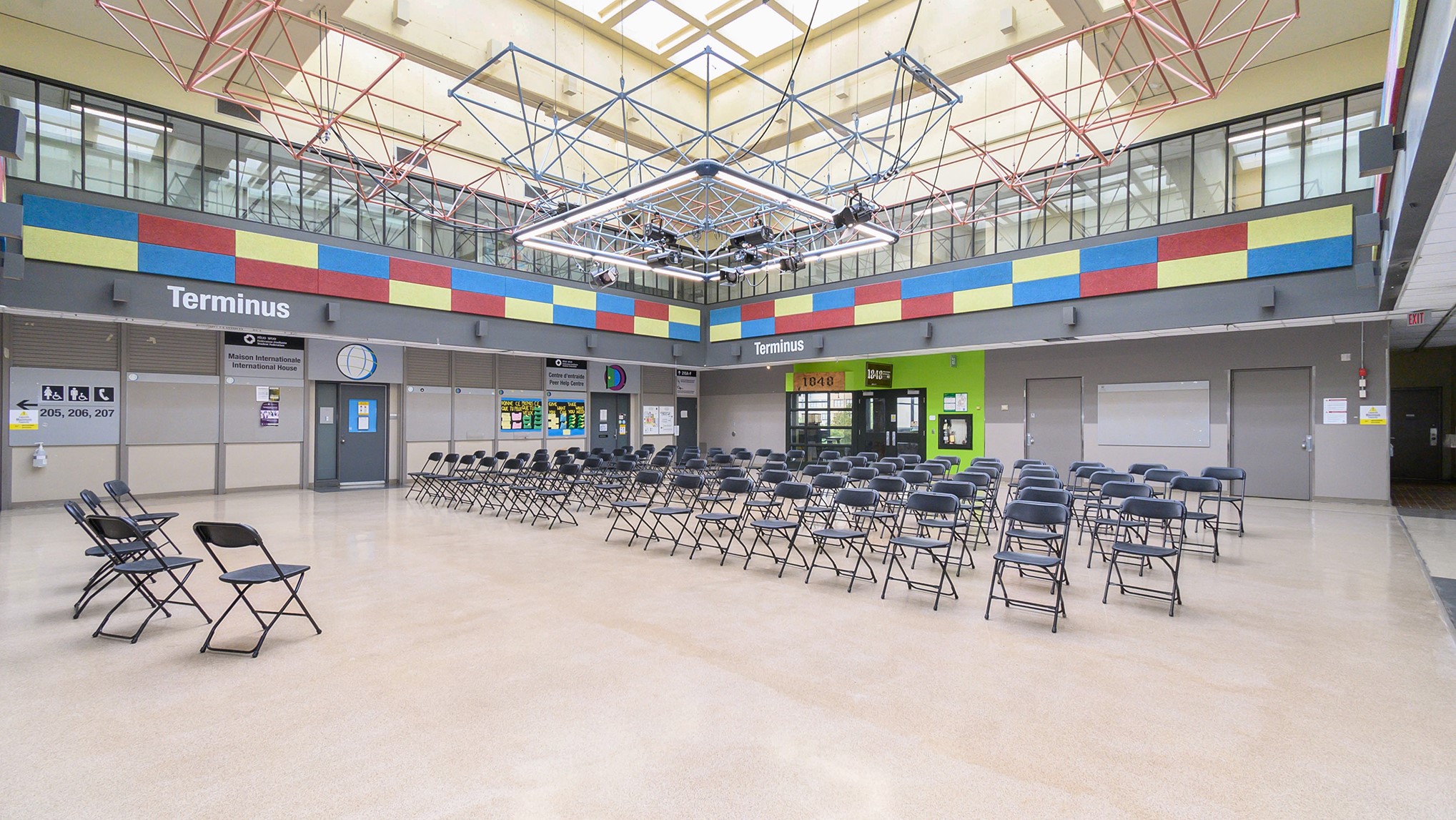 Terminus space with empty chairs set up.