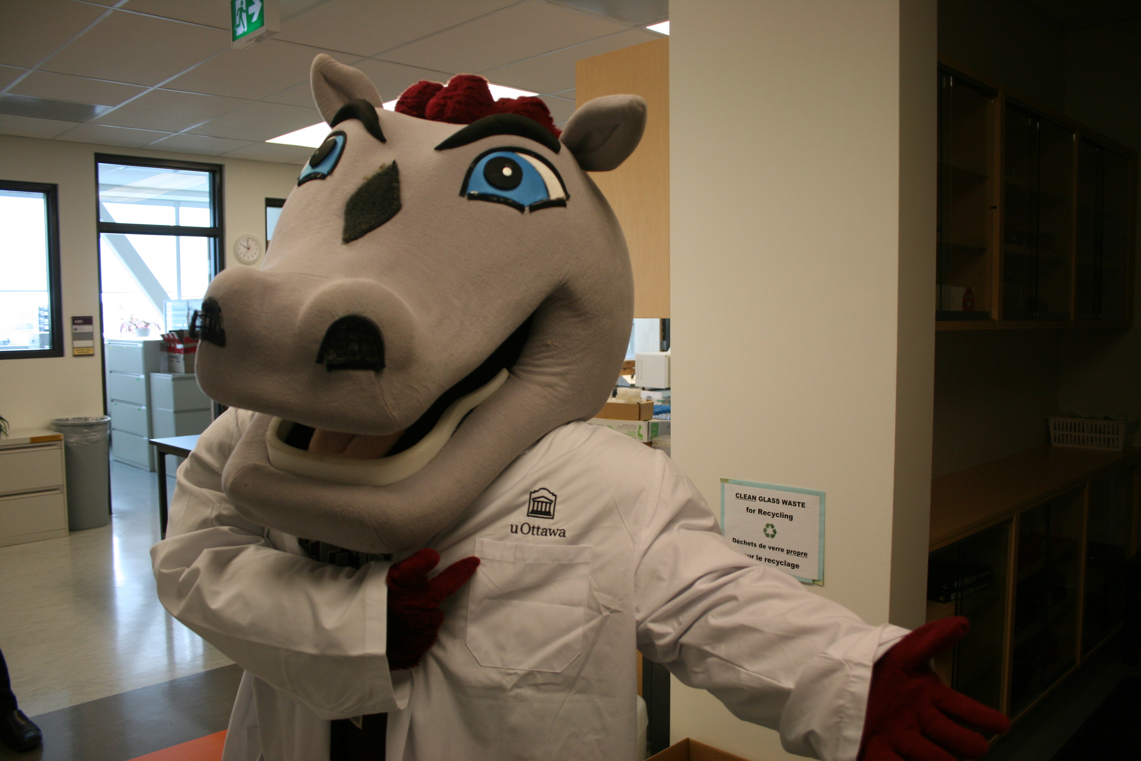 GGEE's mascot in a lab coat