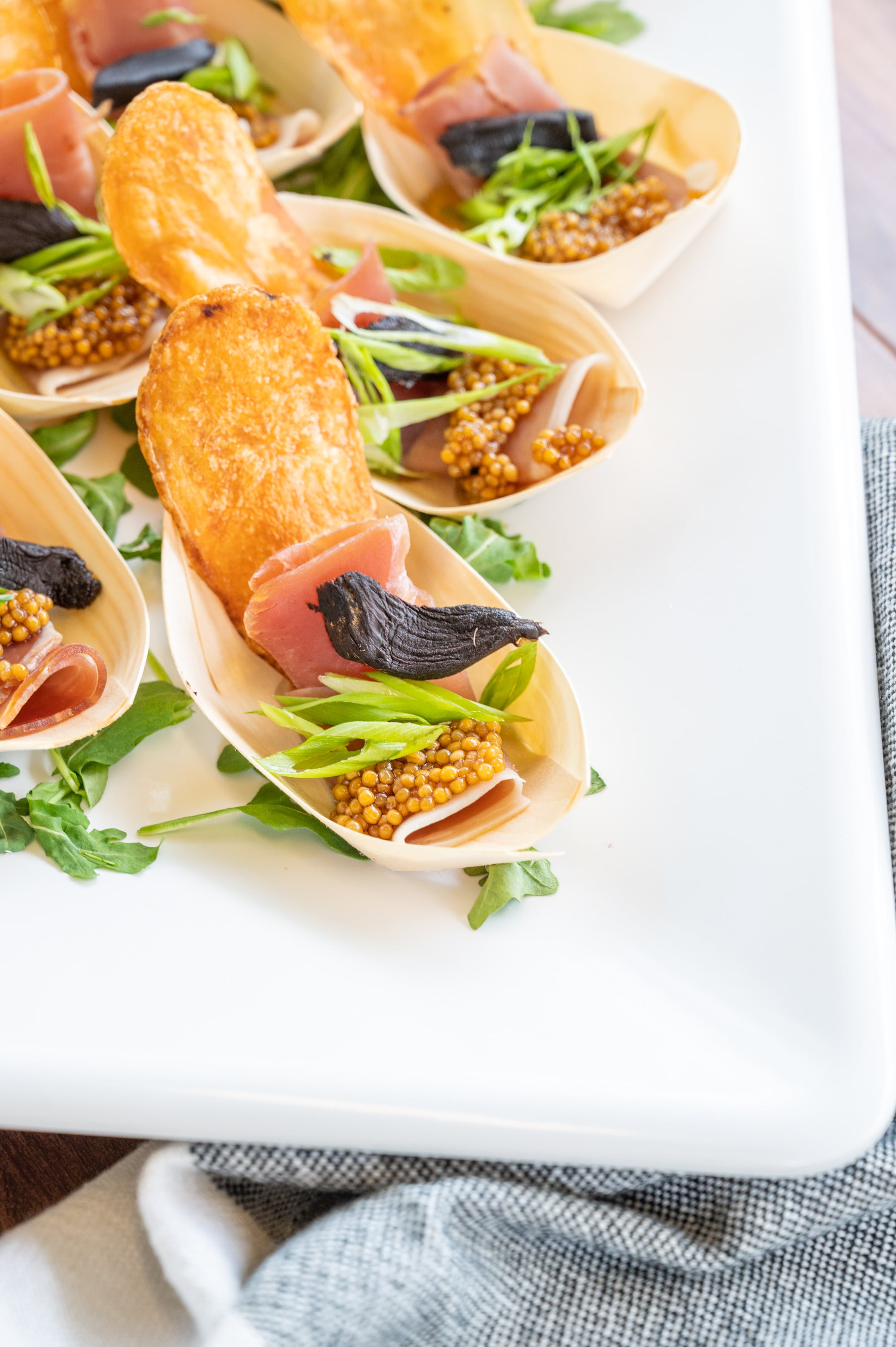 Prosciutto Black Garlic, Scallion, Pickled Mustard Seeds
