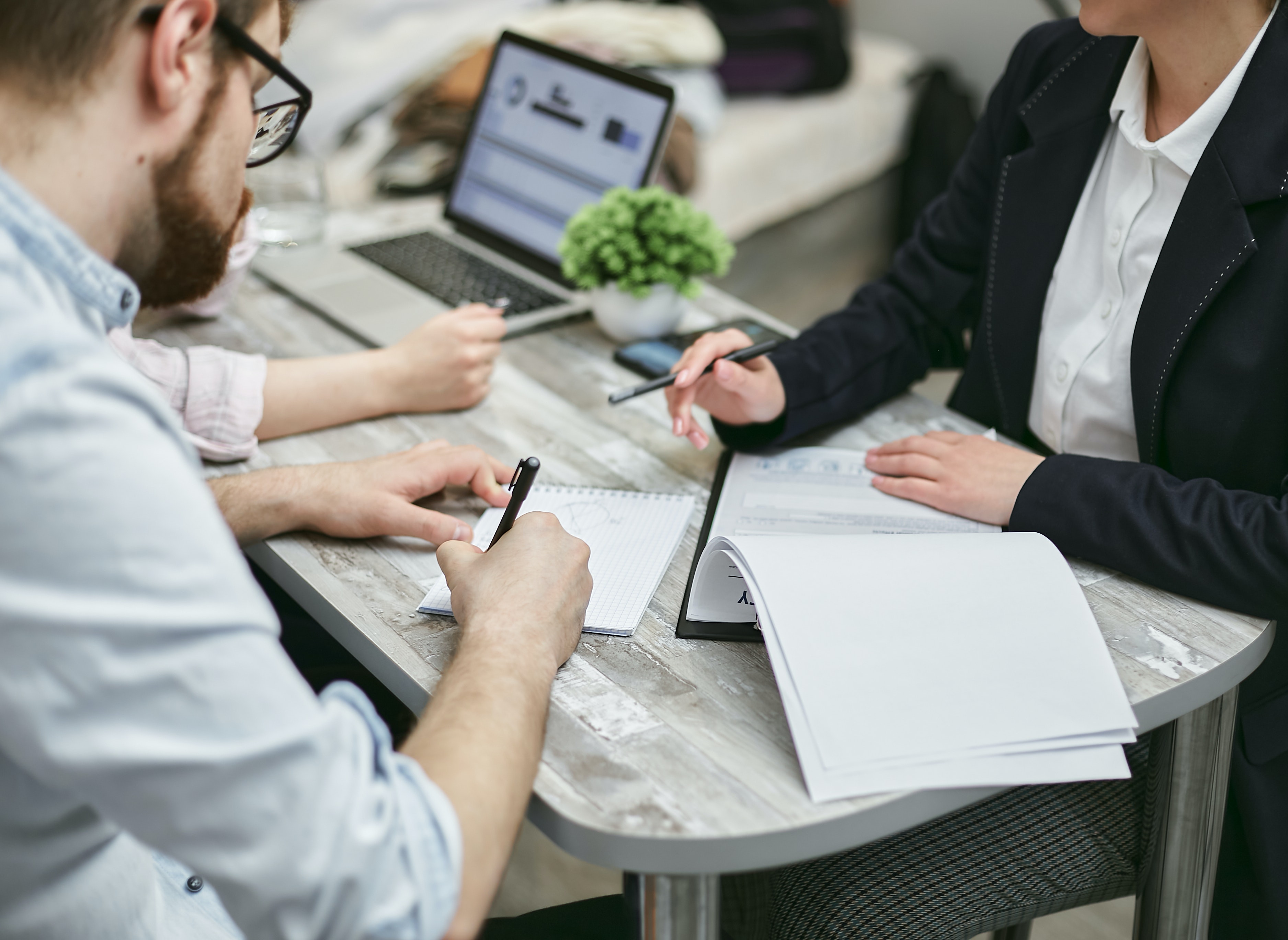 People working on a document