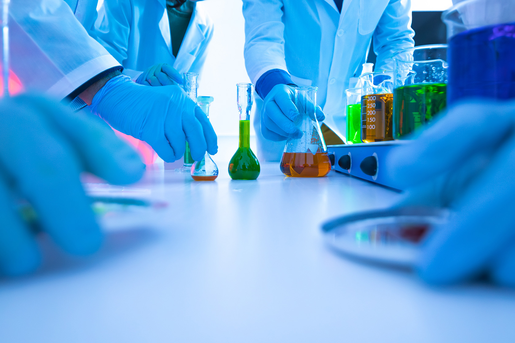 professionals working in chemistry laboratory