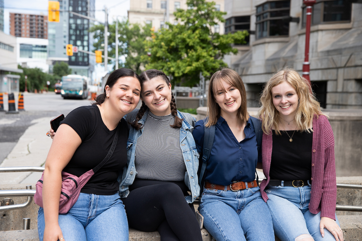 Group of students smiling for the camera
