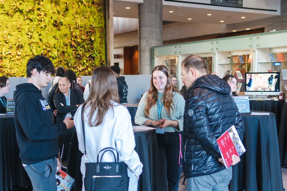 Students group chatting during an event