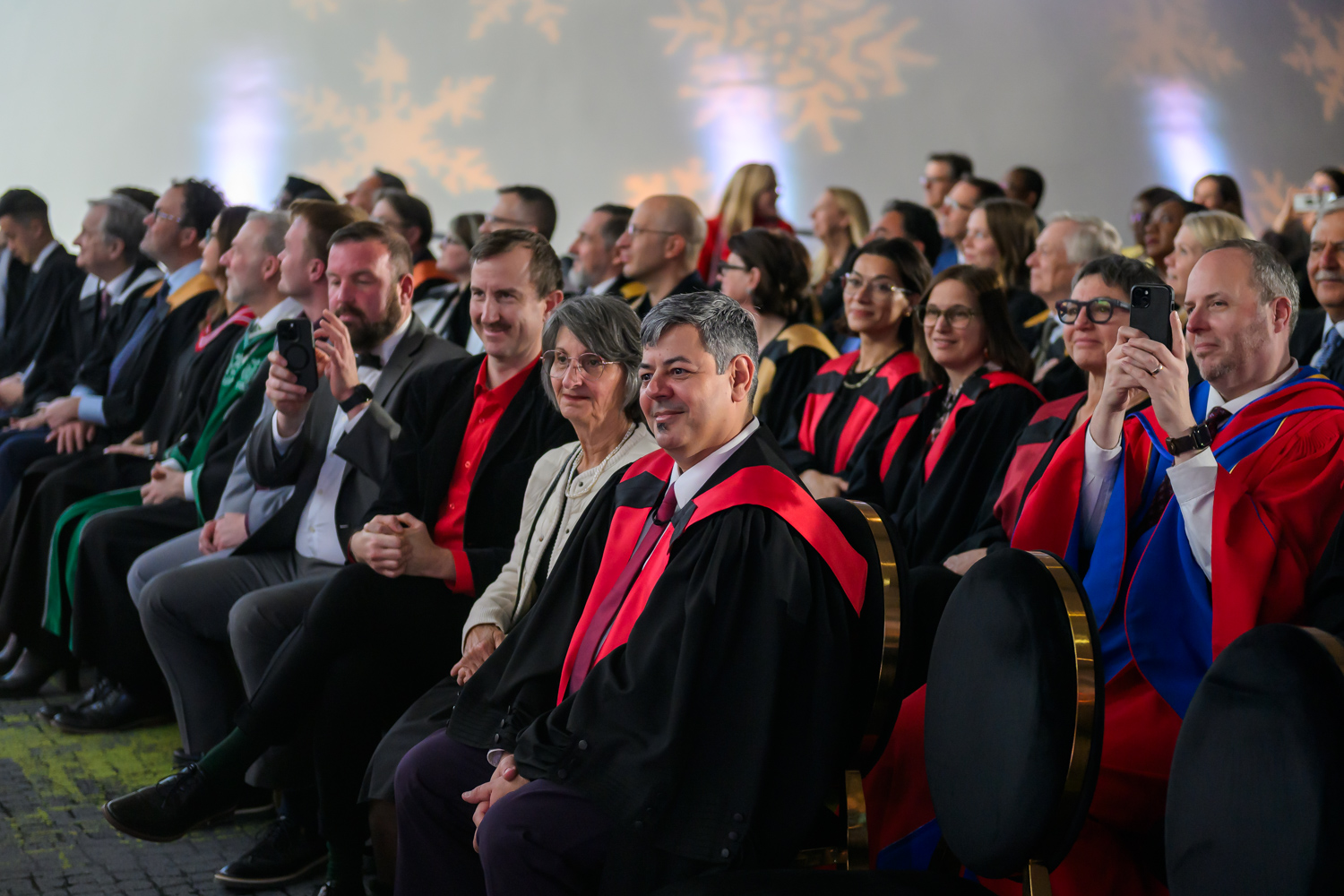 Marie-Eve Sylvestre's family members and academic members sitting in the crowd at the Installation Ceremony