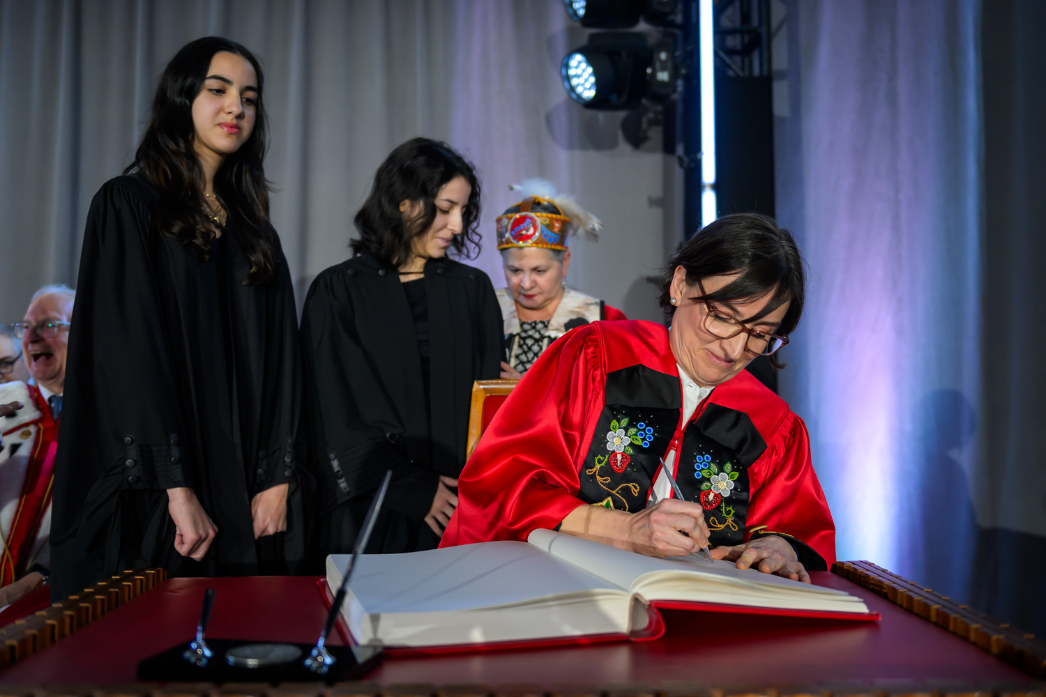 Marie-Eve Sylvestre signing the official book