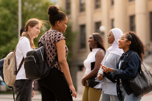Students talking outside of Tabaret
