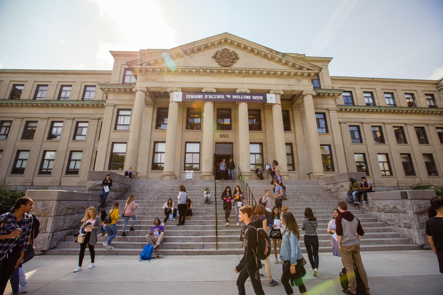Students walking in front of Tabaret Hall.