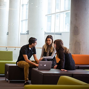 Group working in Crossroads Learning building