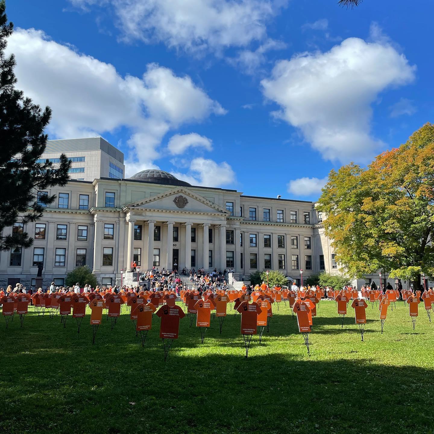 Tabaret Hall with orange shirt signs on the lawn