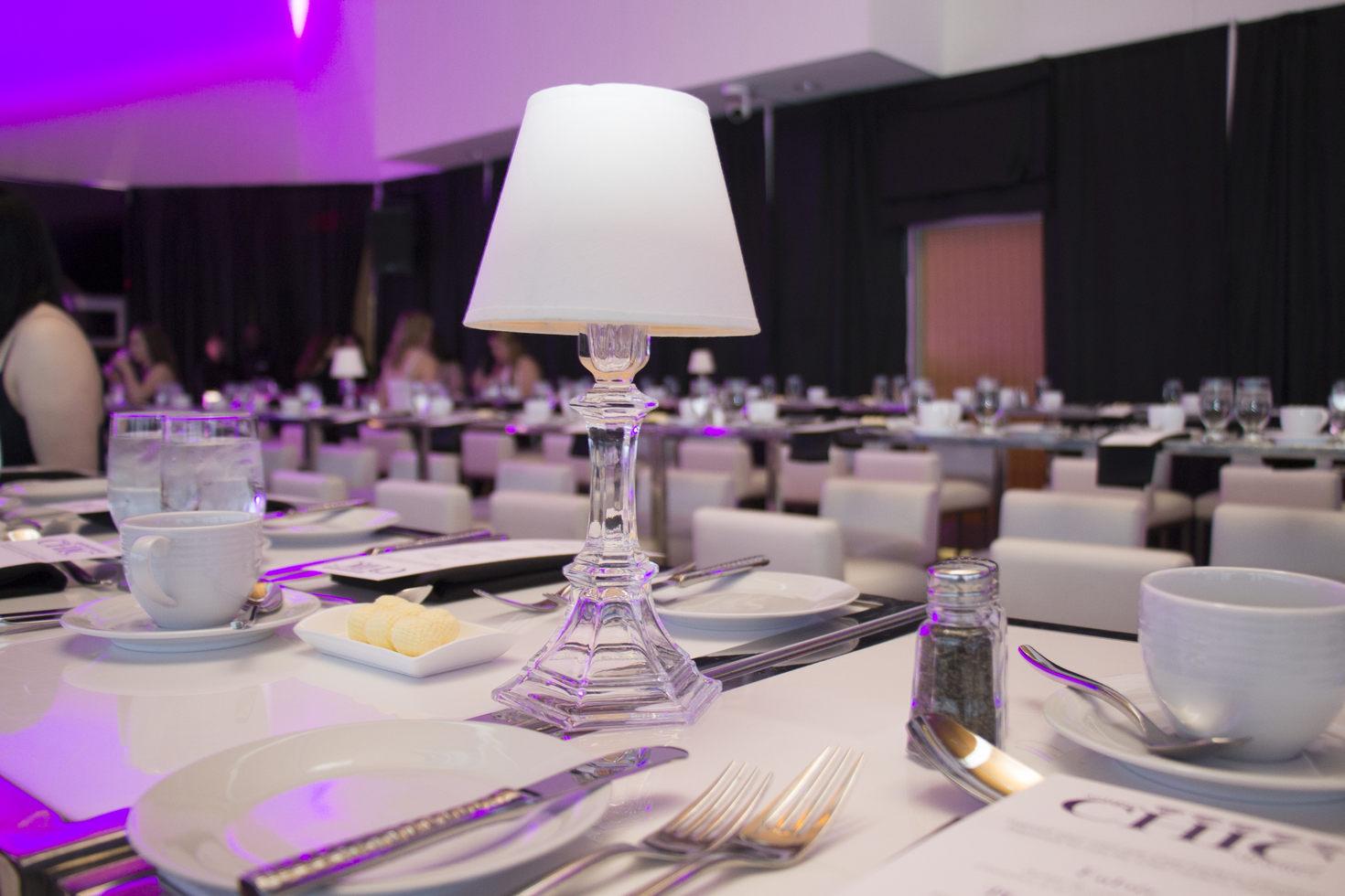 Event space in evening with purple lighting.