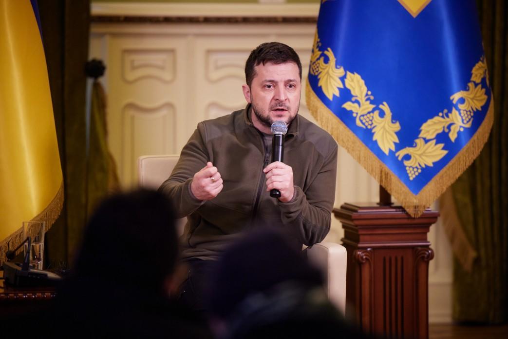 Ukraine President Volodymyr Zelensky speaking in a microphone