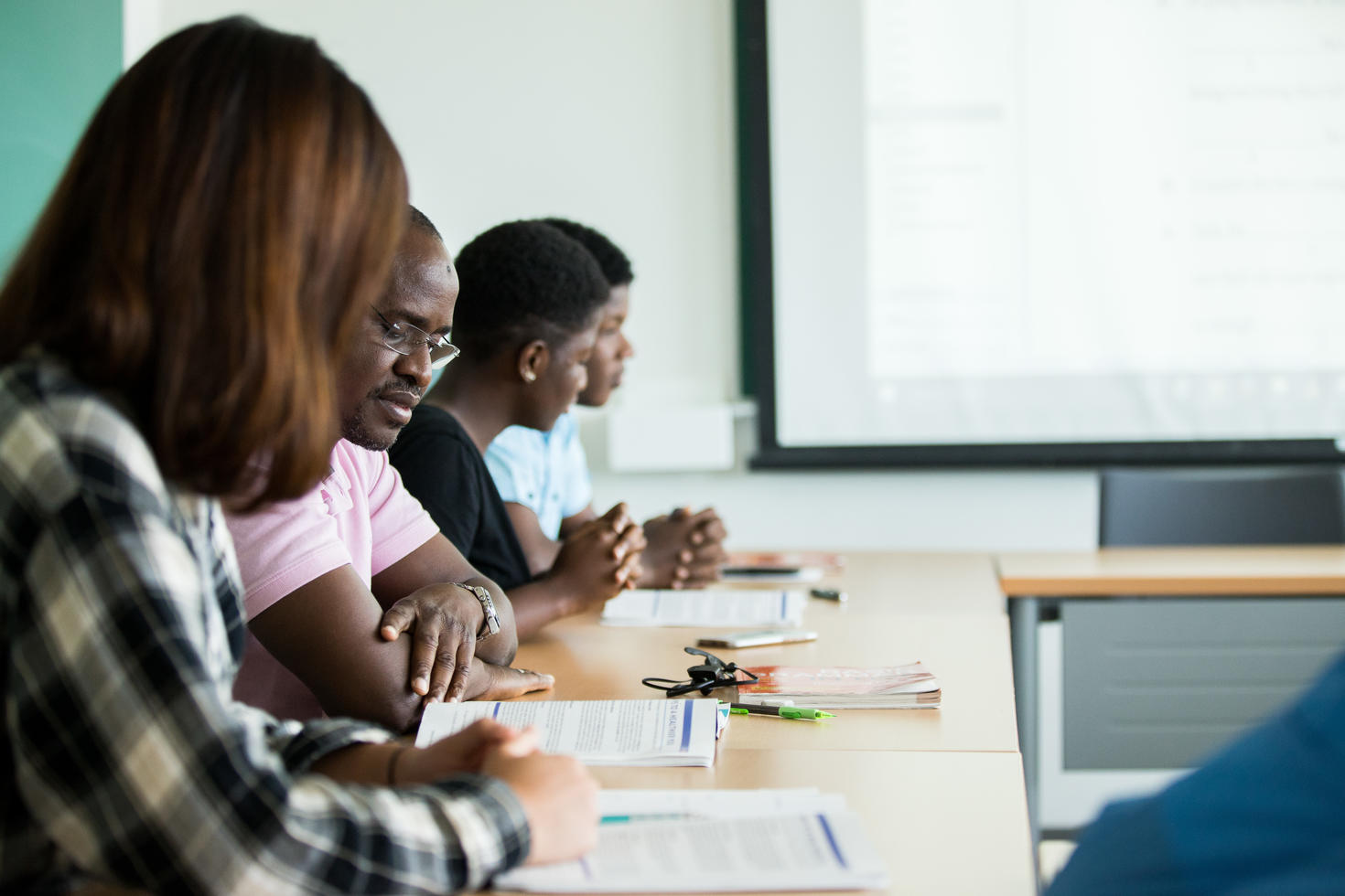 Students studying at table.