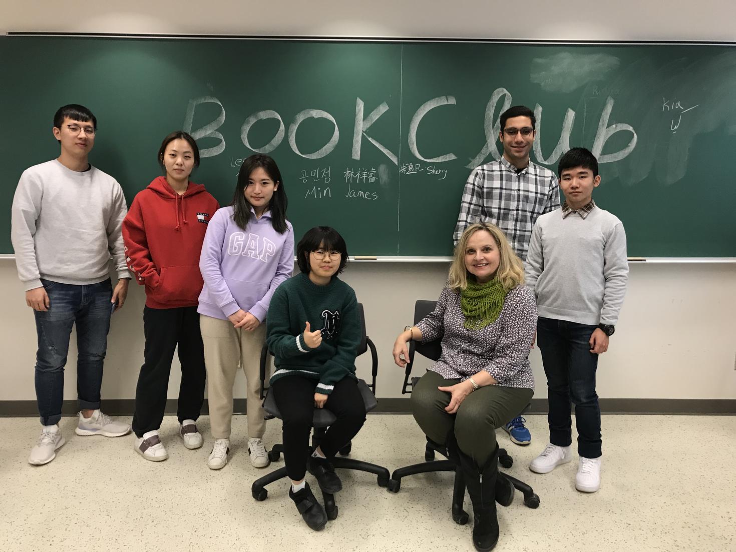 Conversation Club members in class