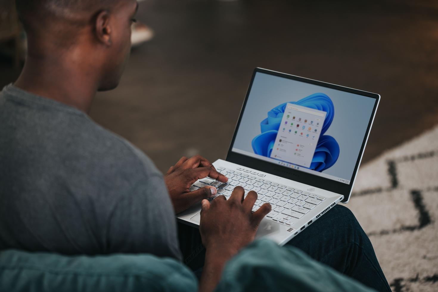 Man updating his computer settings.
