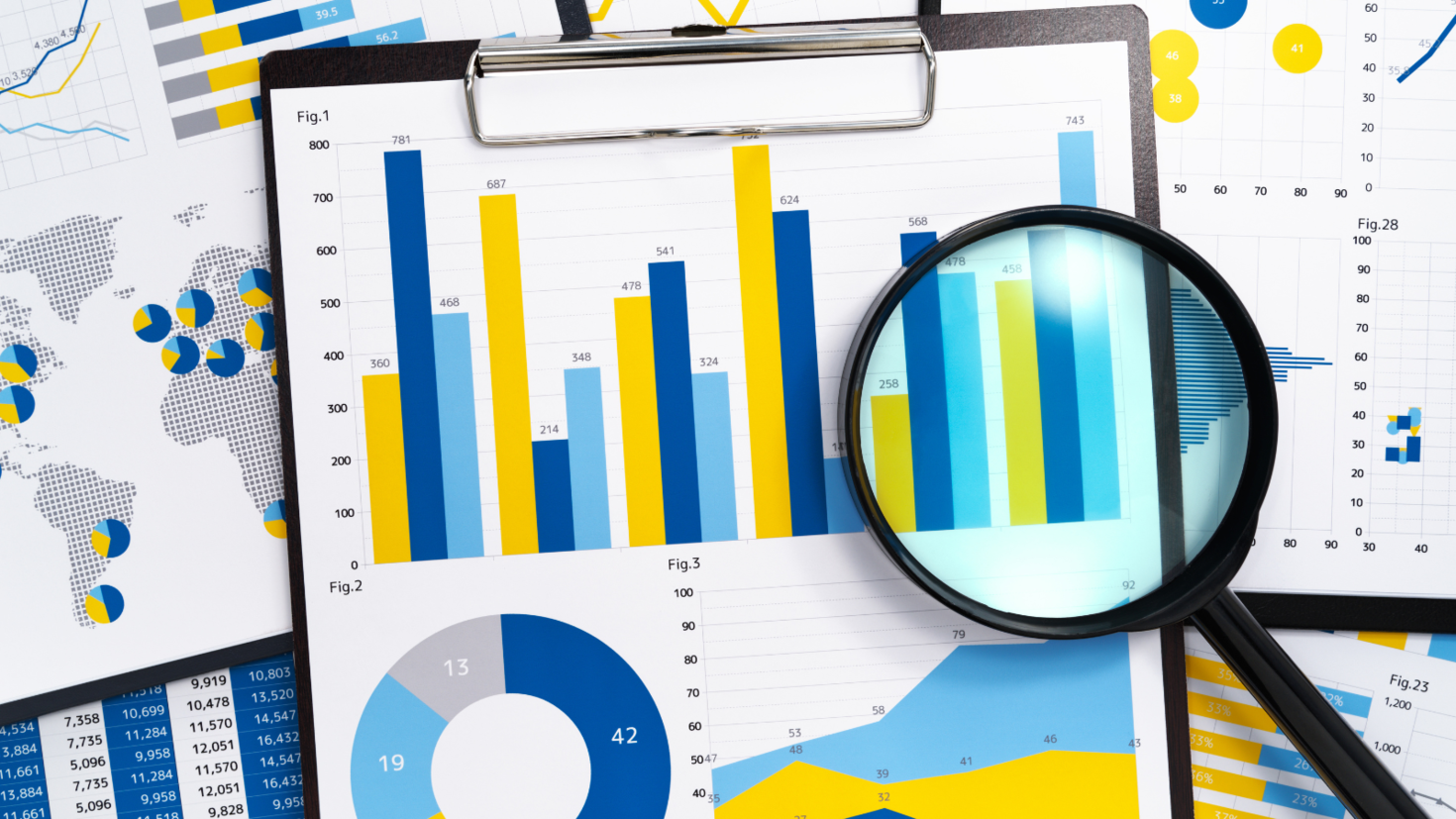 Statistics clipboard and magnifying glass
