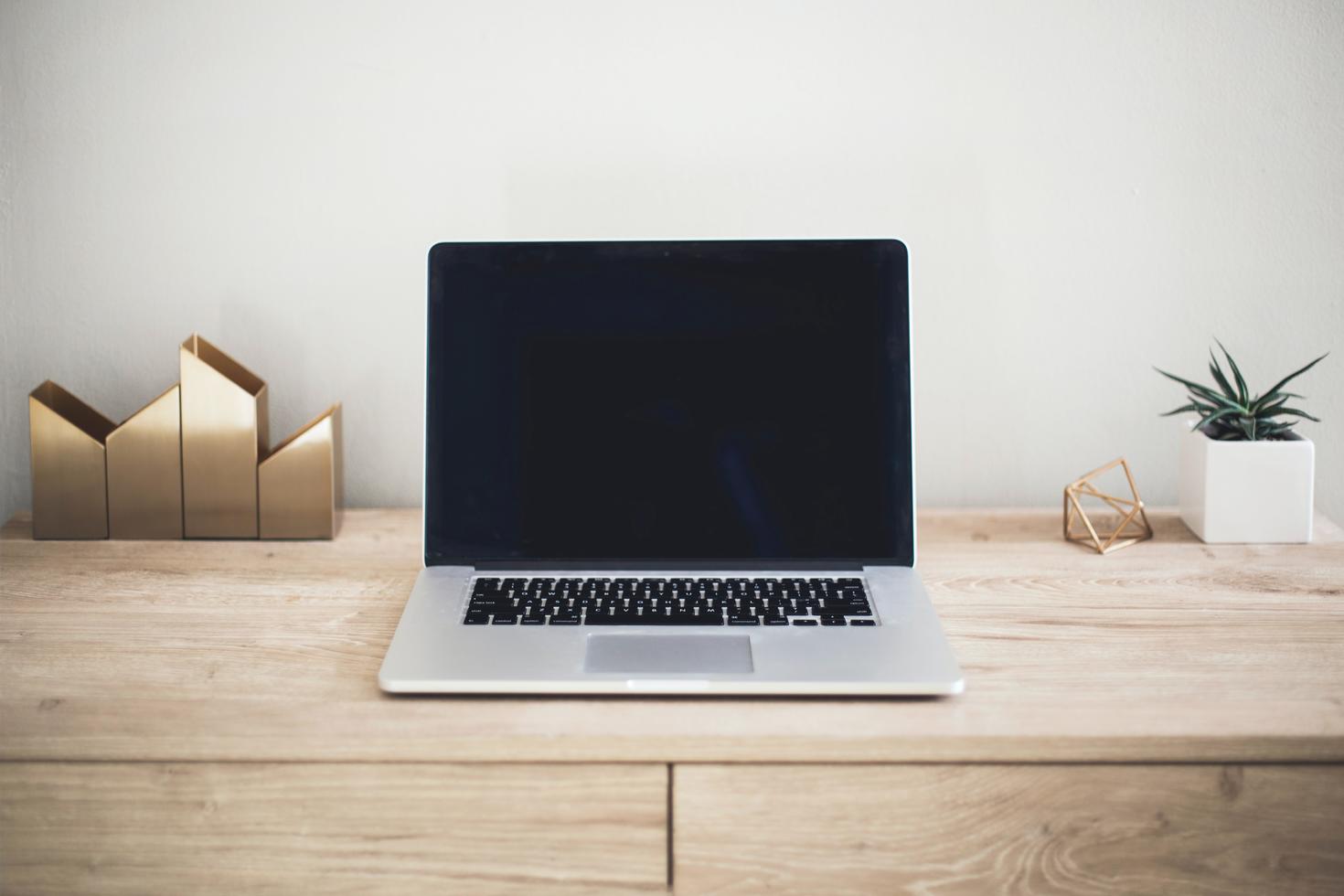 Desk with laptop.