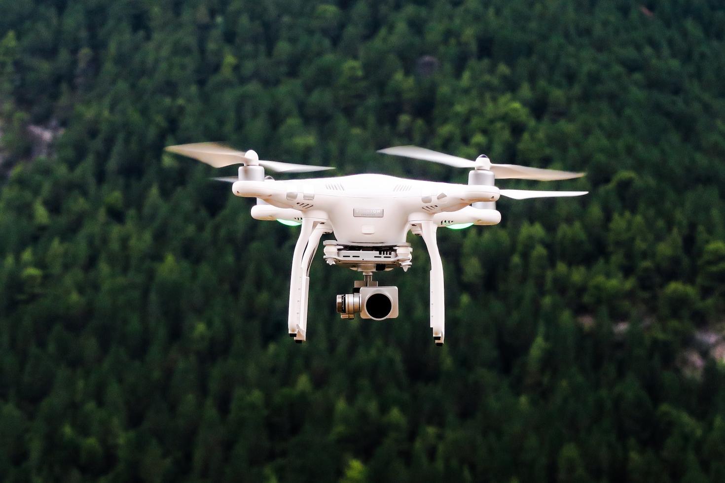 White drone midflight
