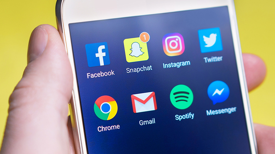 social media icons on mobile phone screen