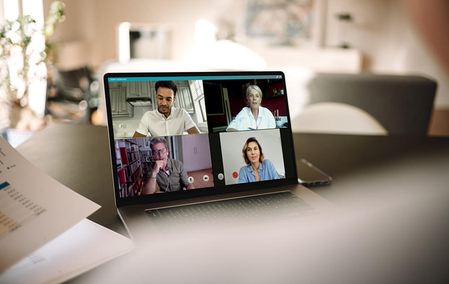 Online meeting shown on a laptop screen