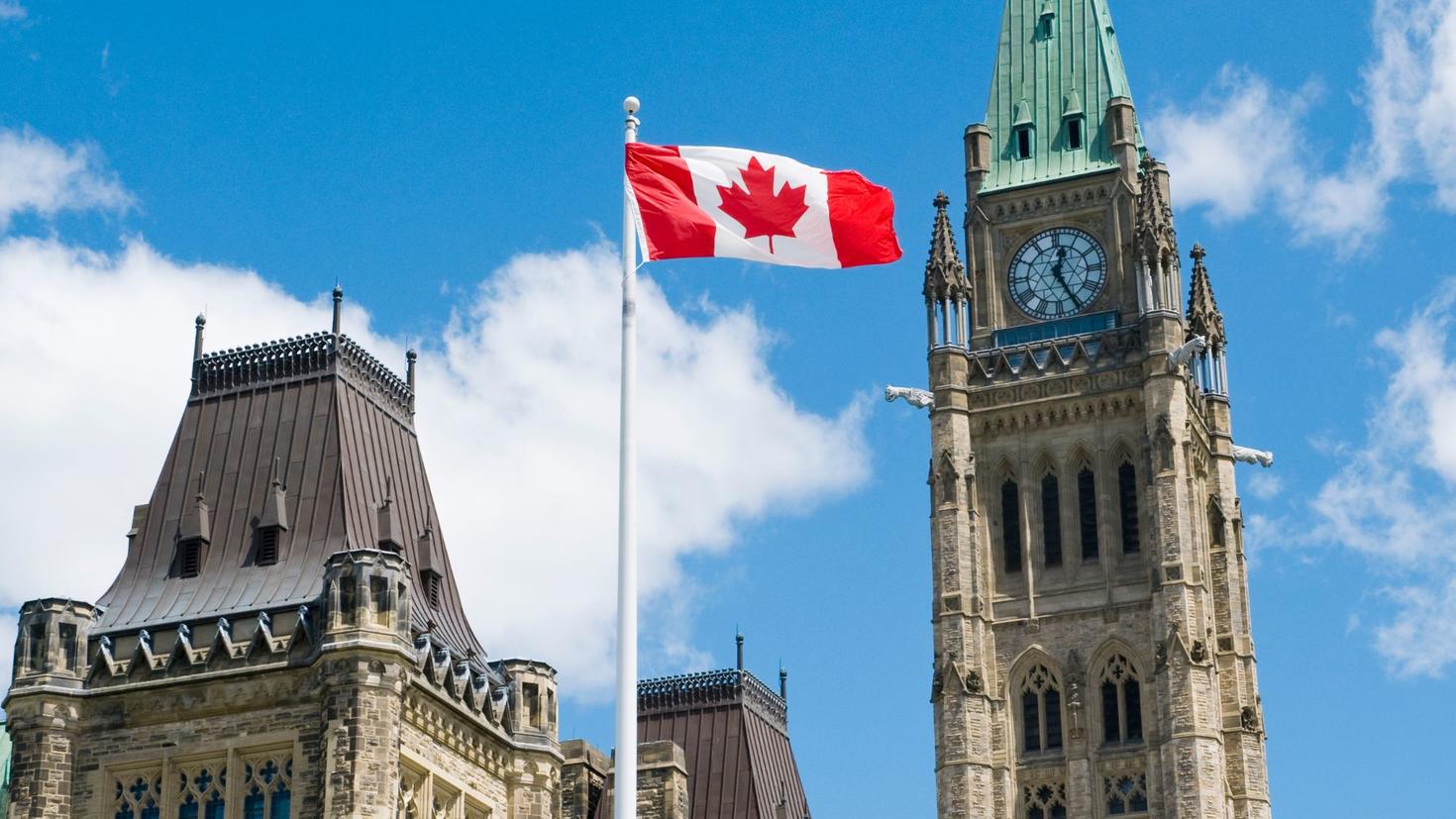 Canada flag in front of parliament
