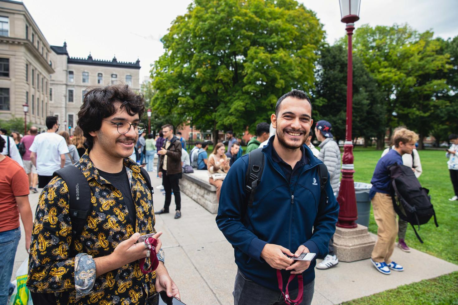 Two students walking and chatting