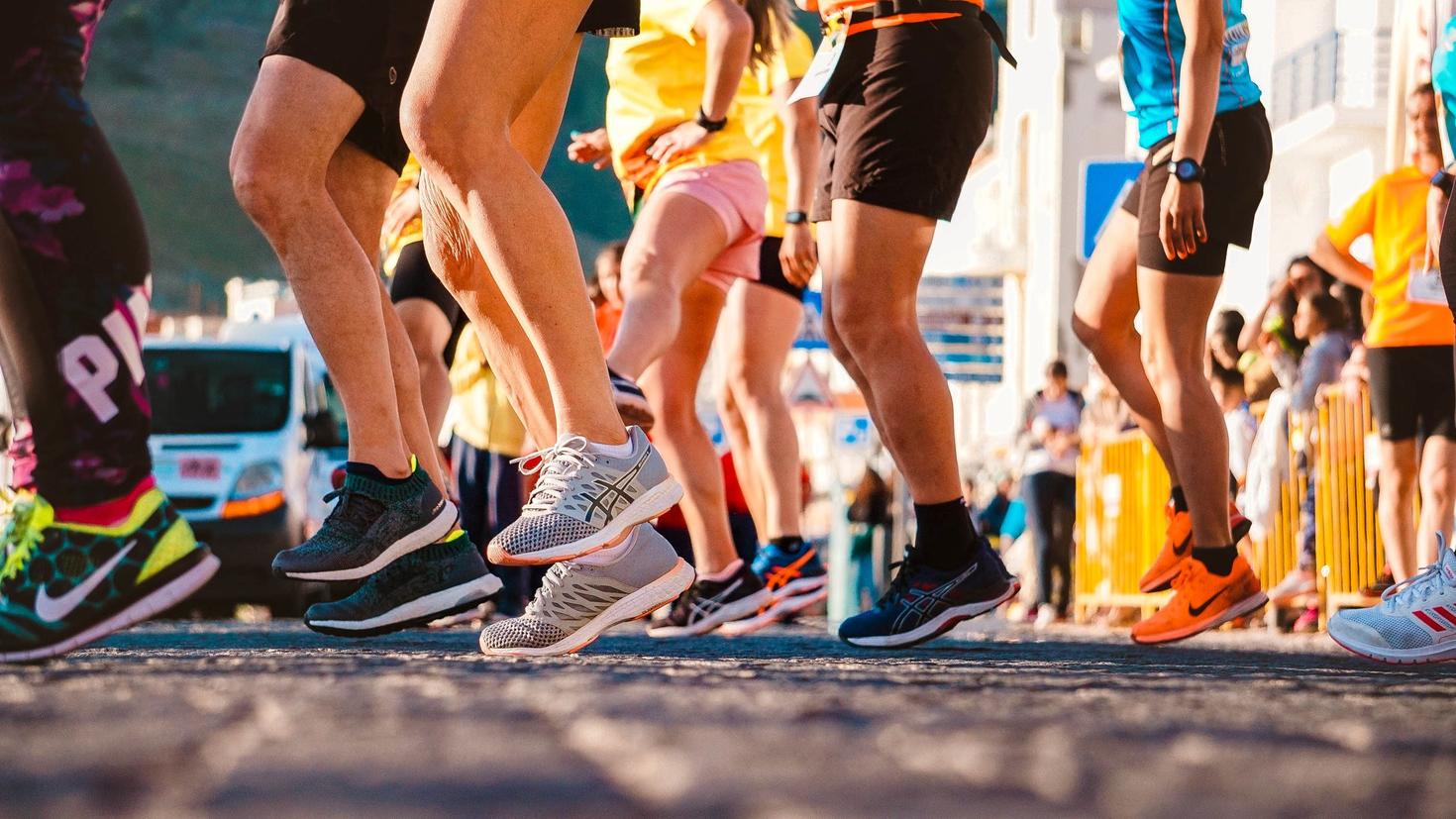 sneakers or runners warming up for a marathon