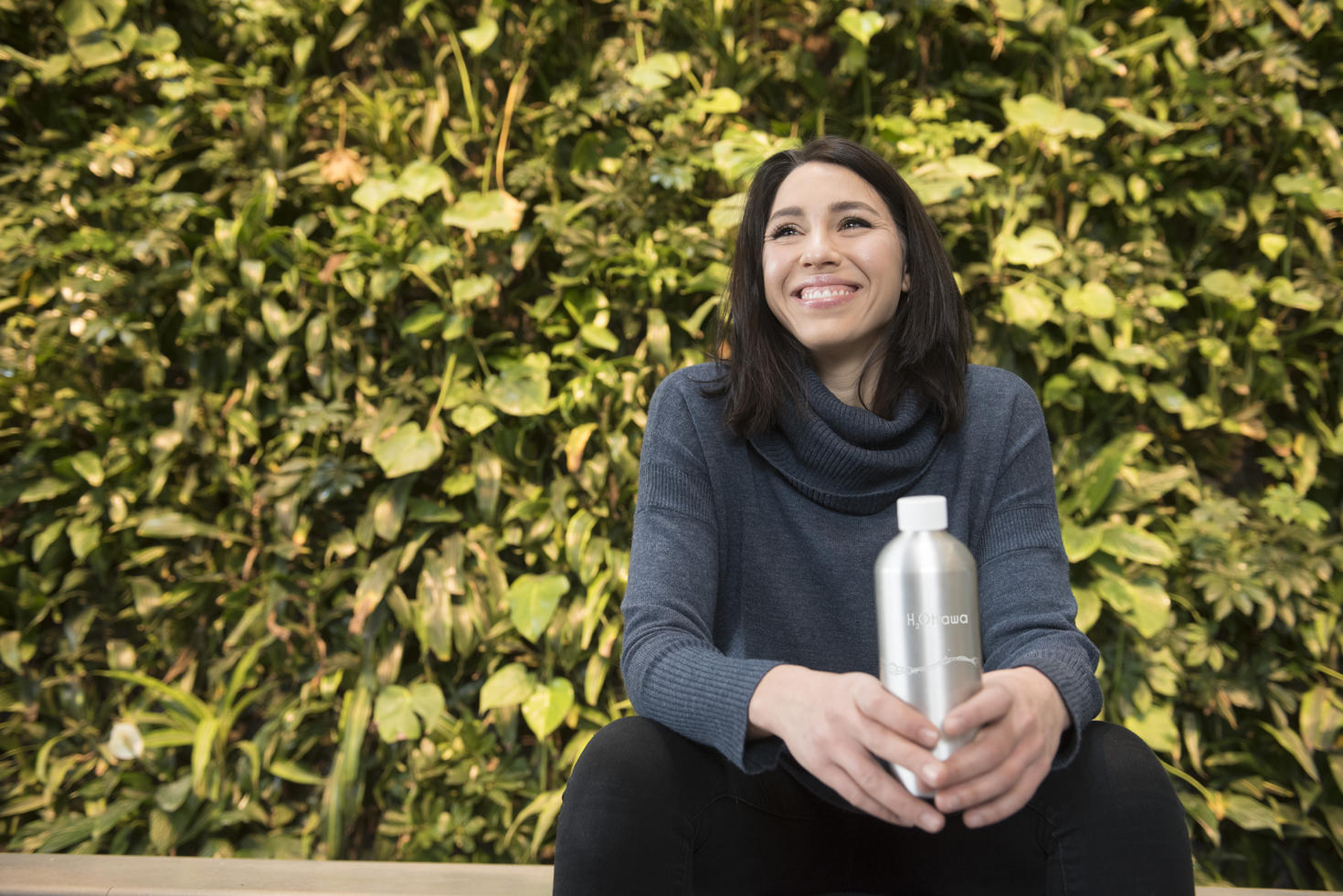 Picture of Celeste holding the H2Ottawa water bottle