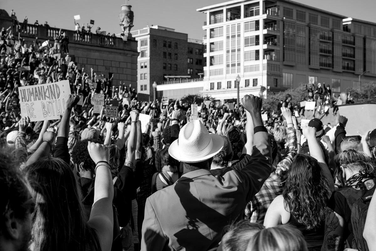 BLM crowd raises clenched fists