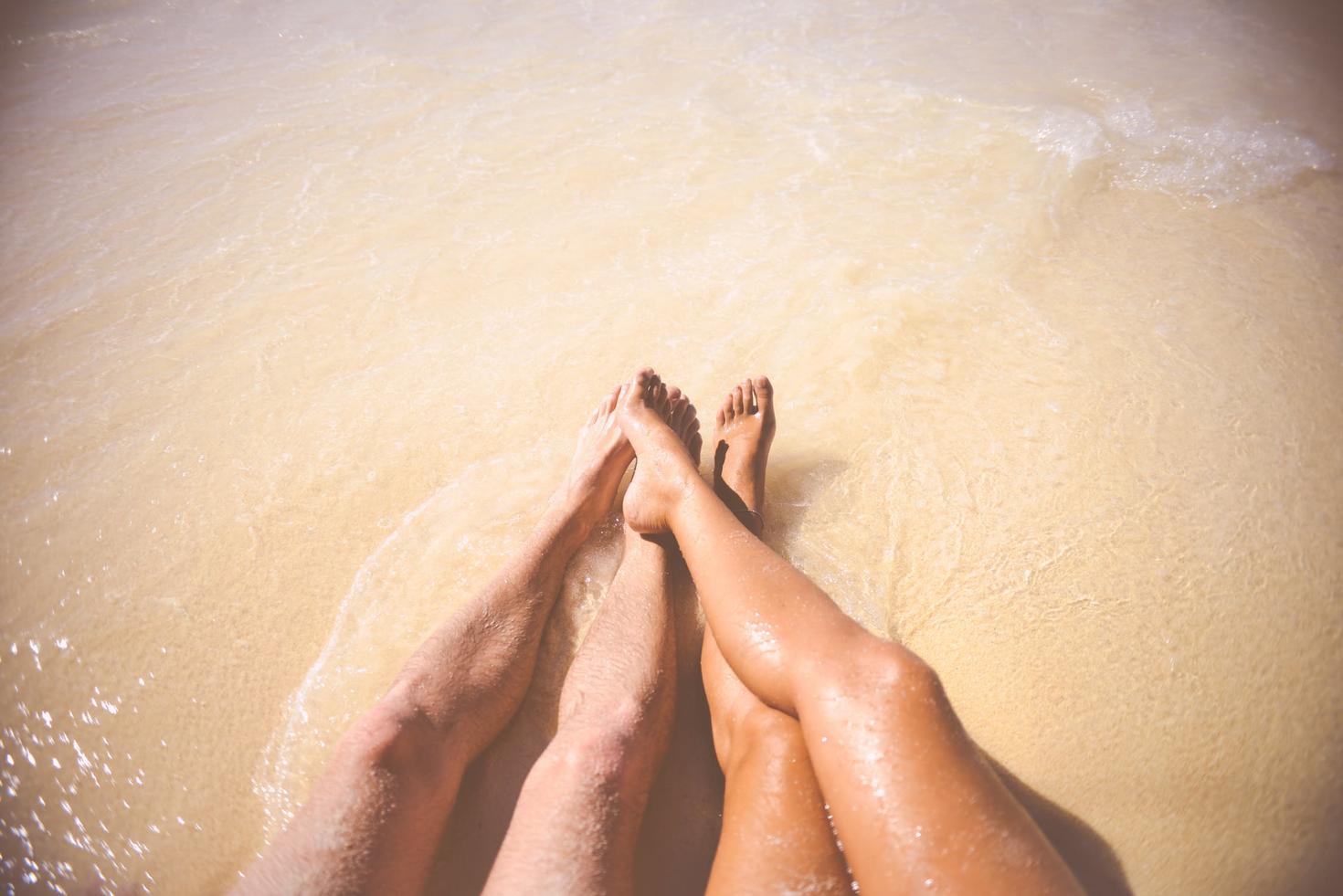 Couple relaxing on the beach