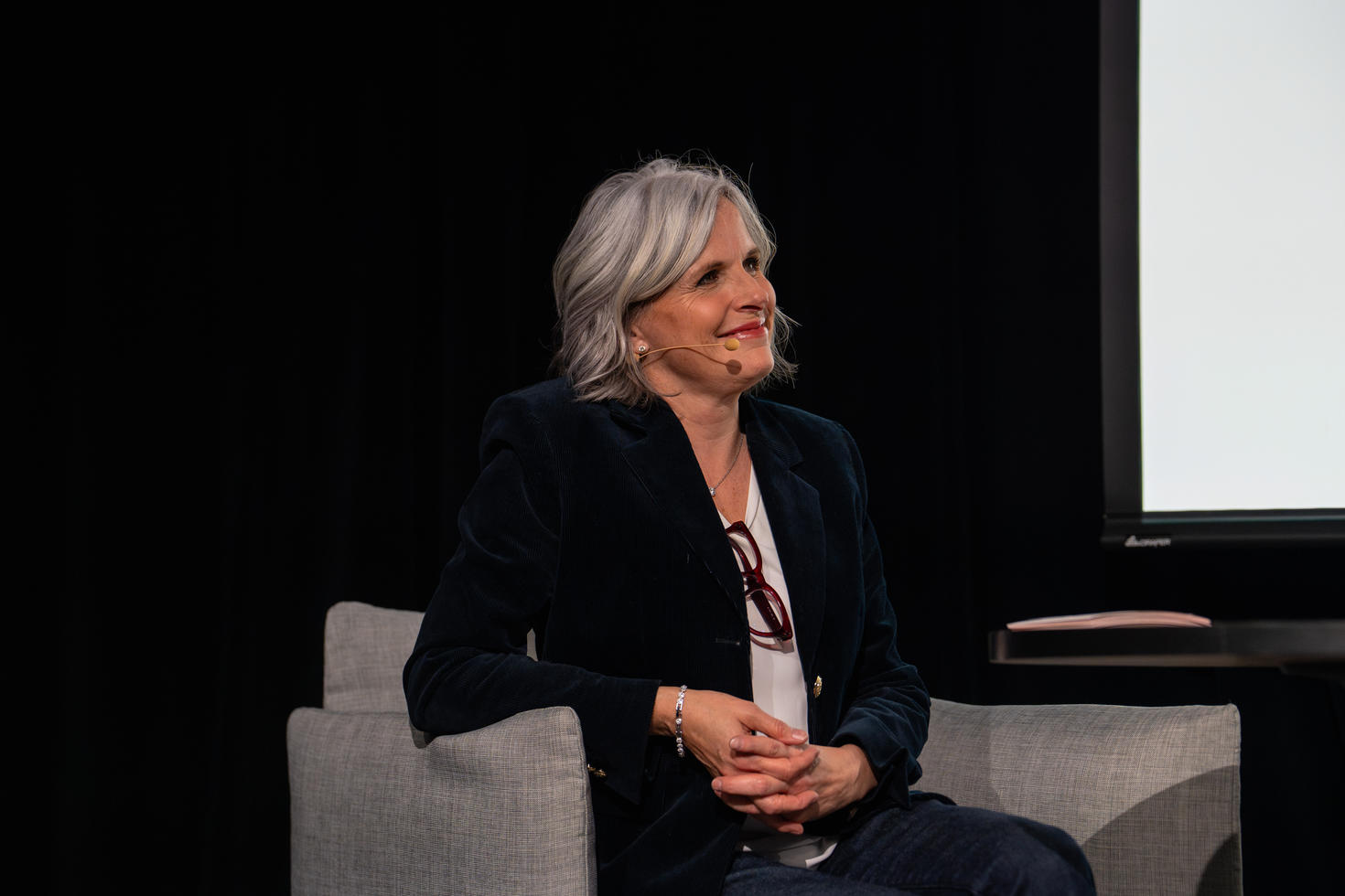 Moderator Annie Hudon-Friceau (BA ‘95) listens attentively.