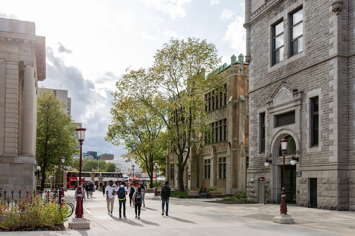 students walking near Academic Hall