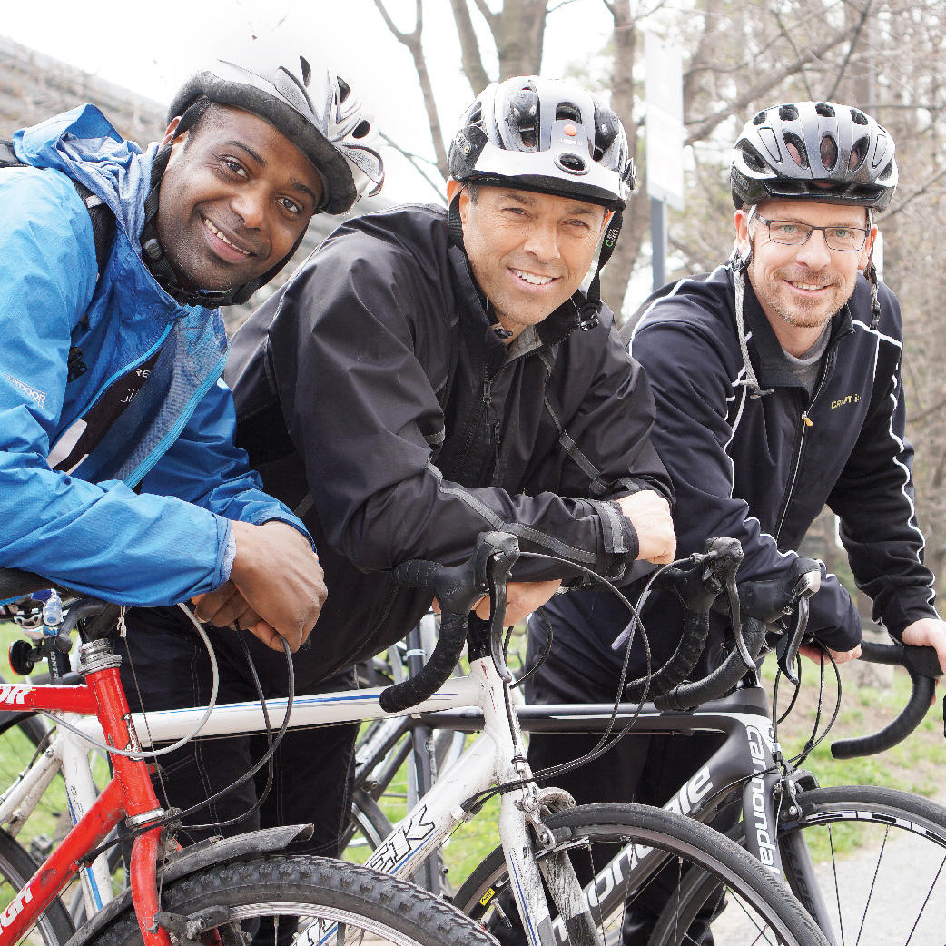 People biking to work on campus