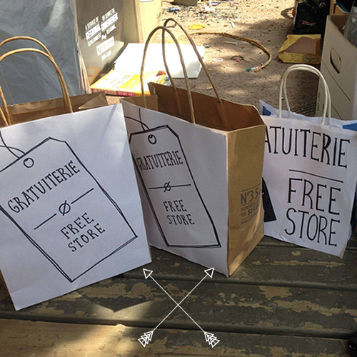 reused bags with the Free Store logo on them