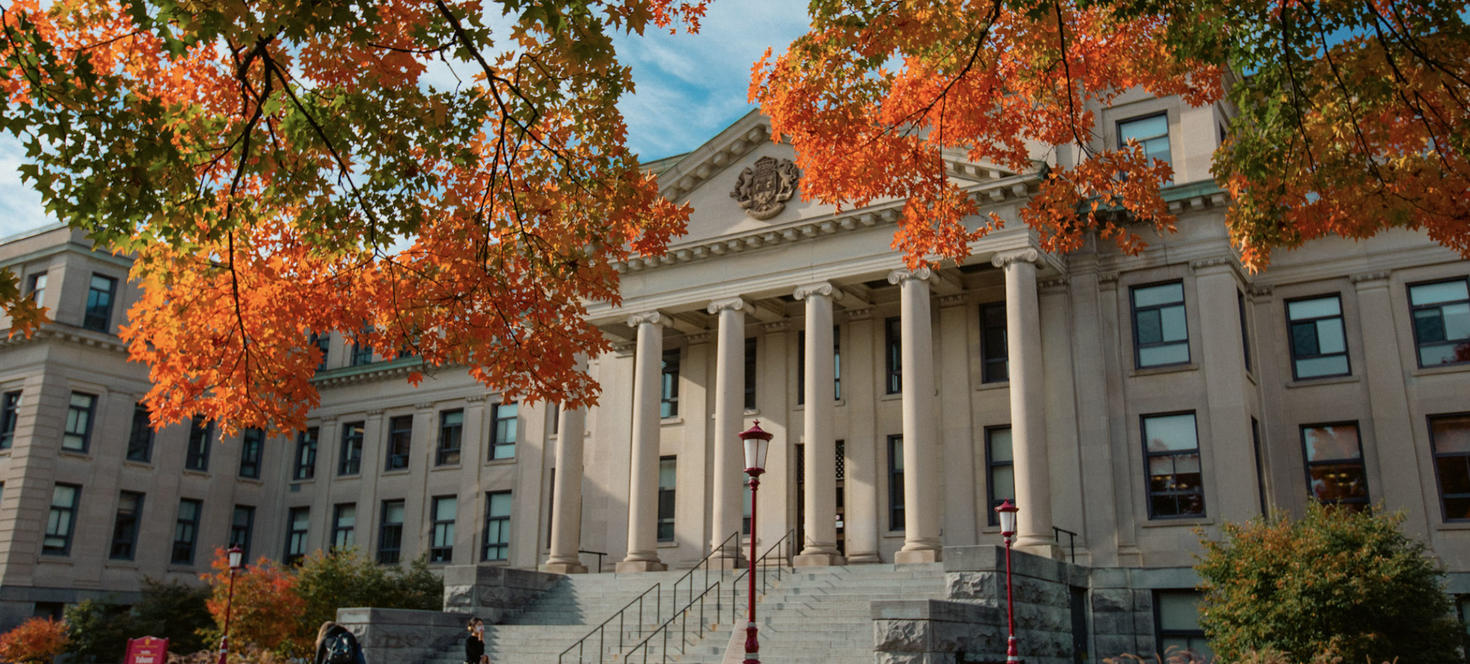 Tabaret hall with fall leaves on trees