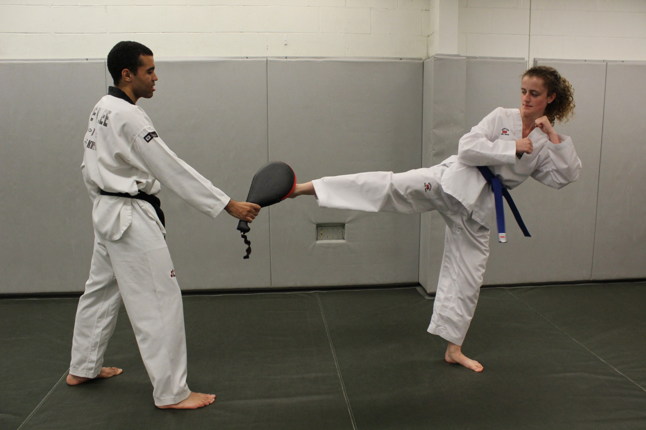 People doing martial arts.