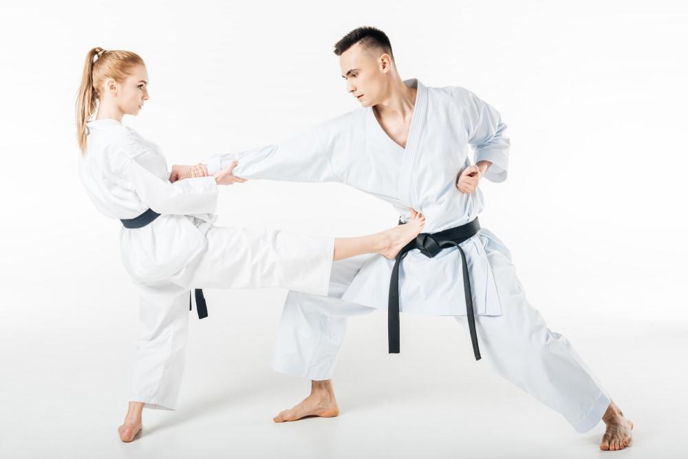 Two man doing martial arts.