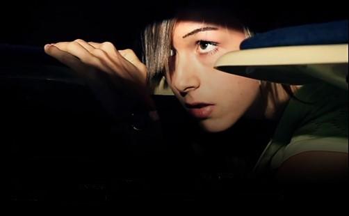 girl hiding in the dark