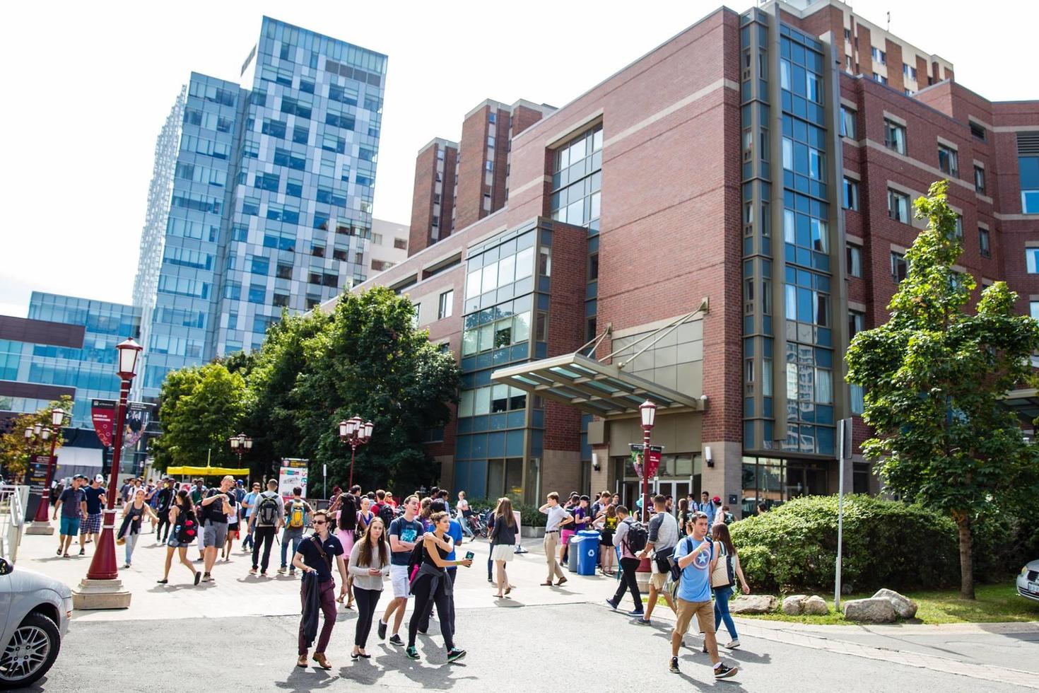 Students walking in front of the FSS Building