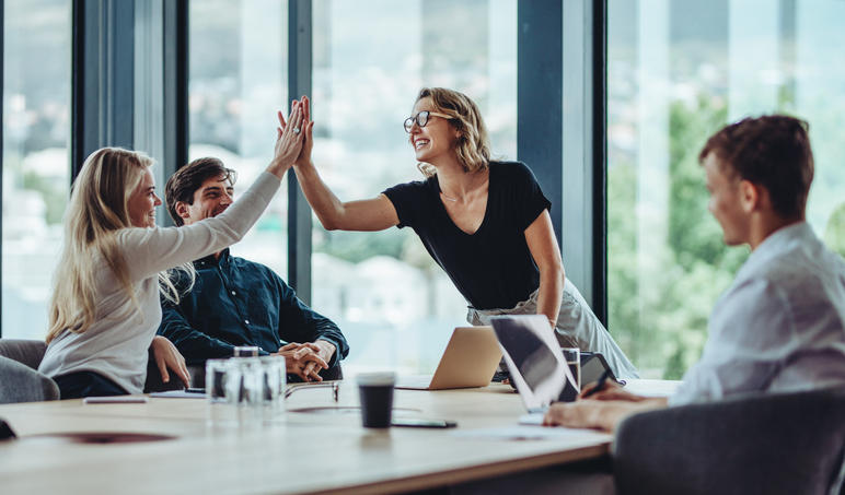 two people giving a high five