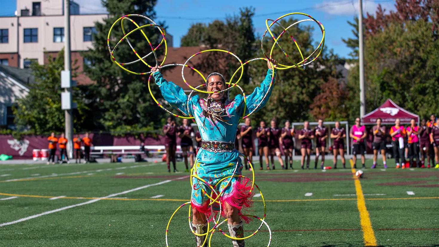 indigenous hoop dancer on Matt Anthony Field