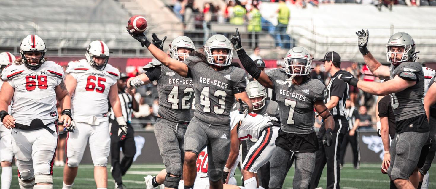 Gee-Gees football team celebrates a win