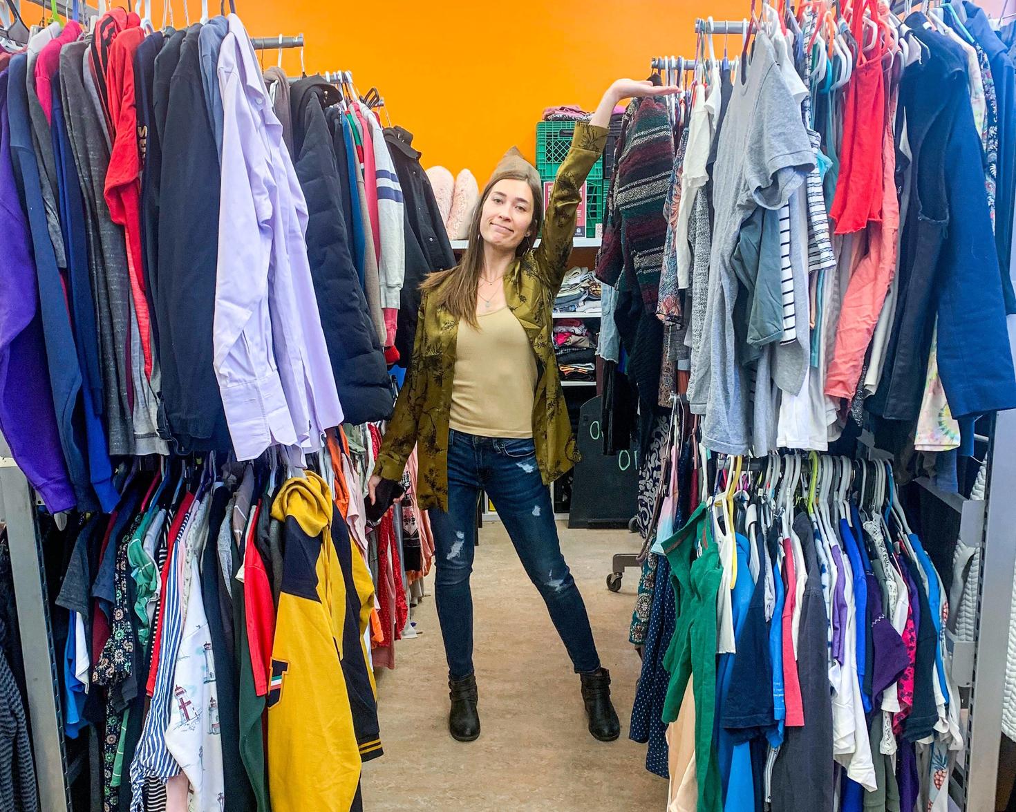 between the racks at the Free Store
