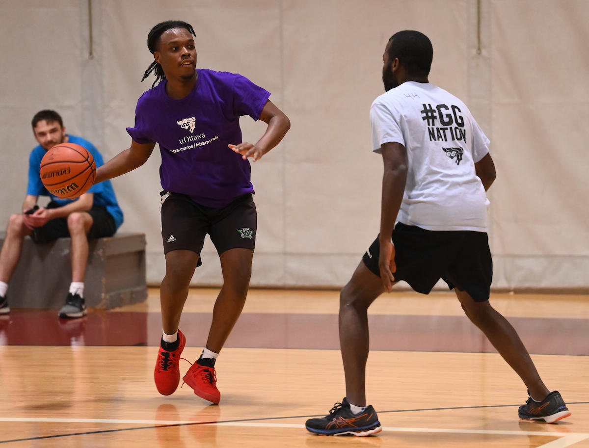 basketball player with ball in hand