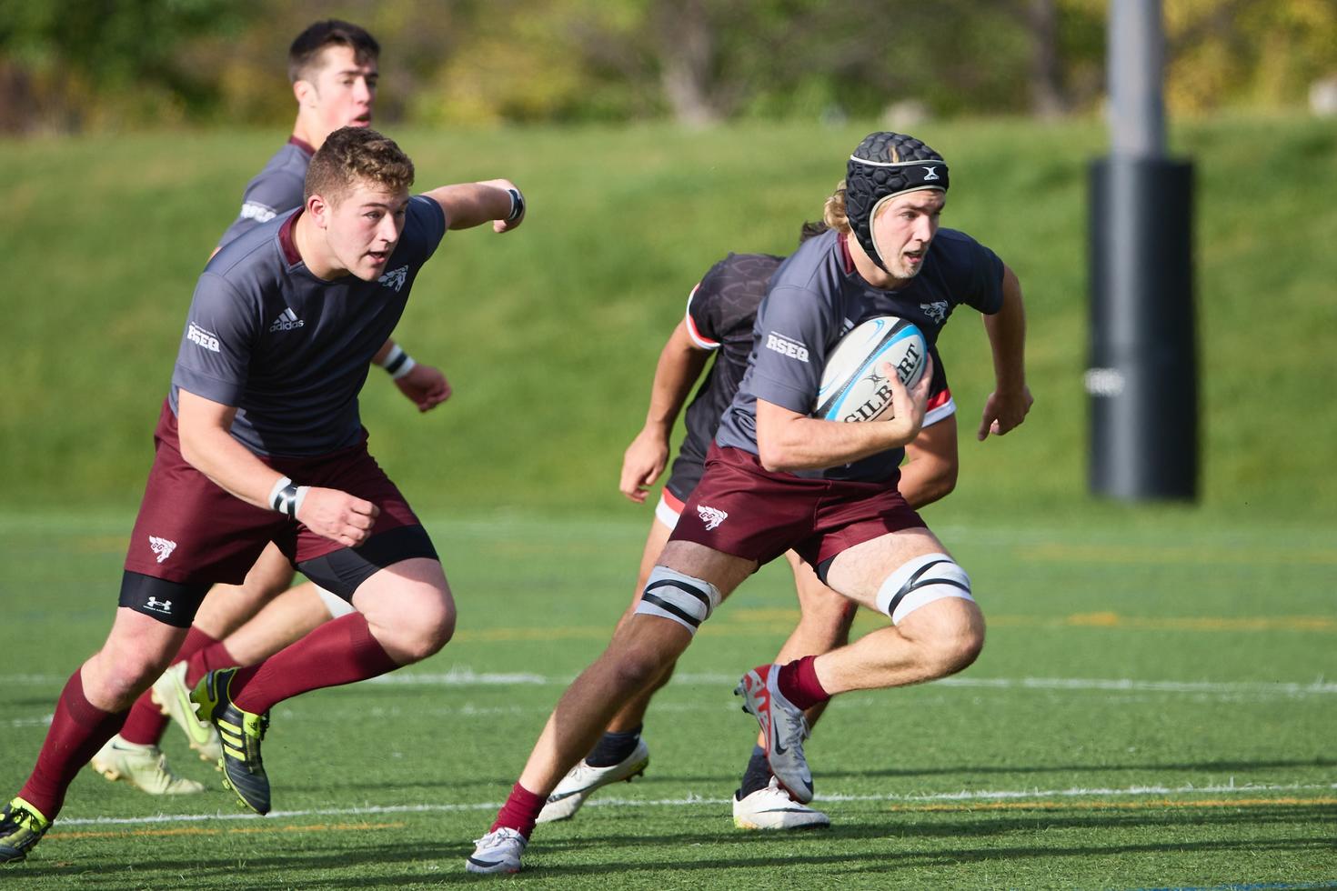 rugby players running