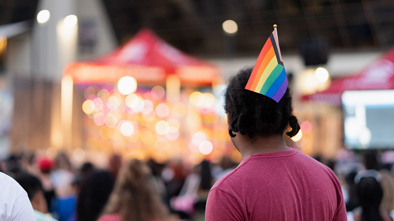 Student with pride flag