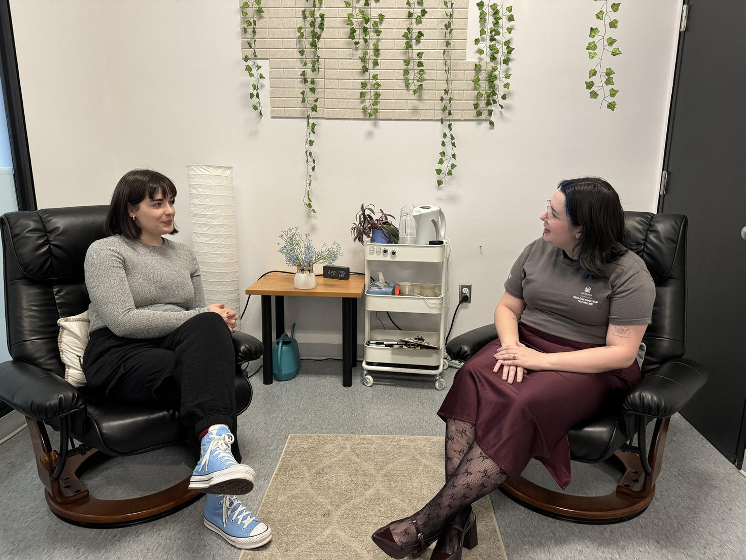 A student talking to a peer support