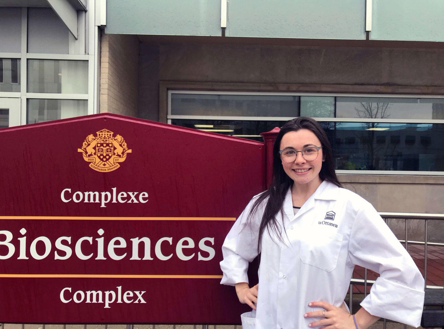 Claire Poulin in white coat