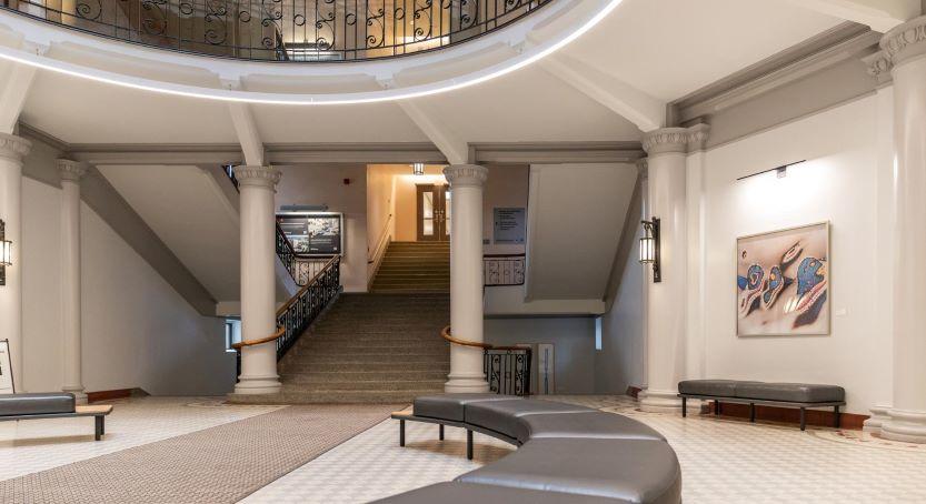The circular main hall or the Rotunda inside Tabaret Hall with Indigenous art on the walls.
